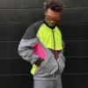 modelo muestra lateral de la chaqueta vórtice multicolor neón de ferdy ferdystreetwear