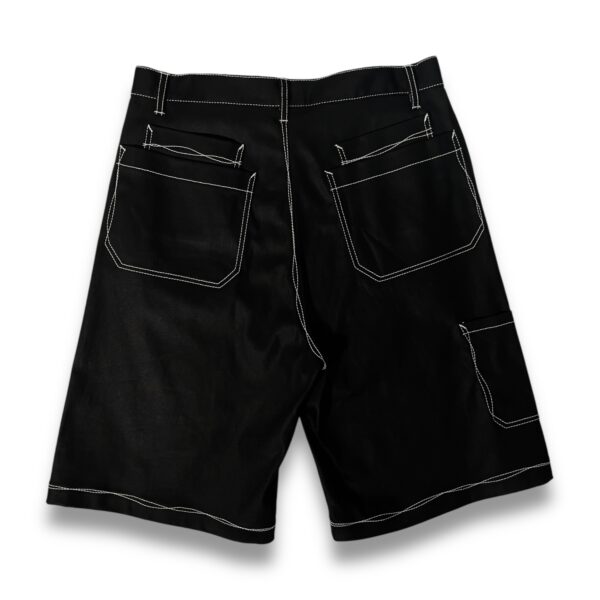 Bermudas Oversize - Denim encerado negro costuras irregulares