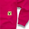 detalle de la sudadera sin capucha básica magenta de ferdystreetwear