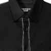 detalle del cuello sobrecamisa denim encerado negro con costuras irregulares de ferdystreetwear